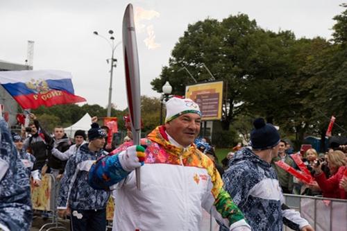 Tocha olímpica, no revezamento, em Moscou / Foto: Divulgação / Sochi 2014