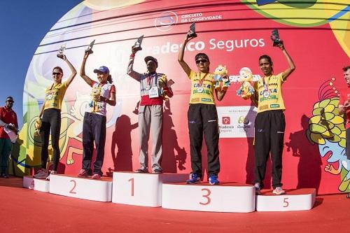 Damião Ancelmo de Souza e Esther Chesang Kakuri conquistam o pódio masculino e feminino, respectivamente / Foto: Vinicius Branca Damião Ancelmo de Souza e Esther Chesang Kakuri conquistam o pódio masculino e feminino, respectivamente / Foto: Vinicius Branca